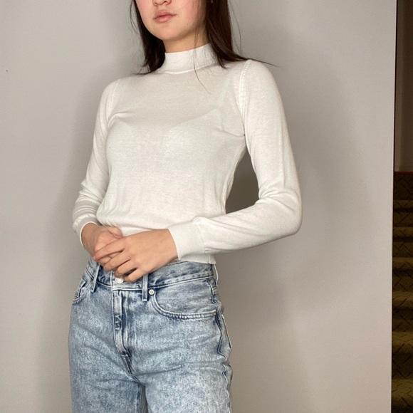 white mock neck sweater